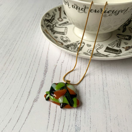 This autumn green signature glass necklace is a handmade necklace that is inspired by my favourite style of creating necklaces.