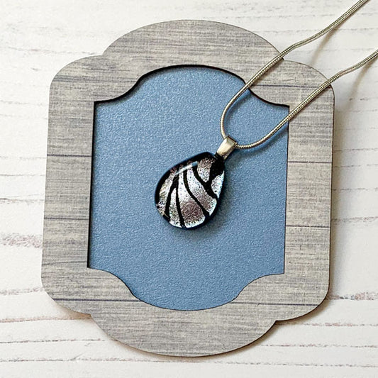 This ingenue zebra handmade glass necklace is in multicoloured dichroic glass. It is a handmade necklace inspired by the princess in all of us!