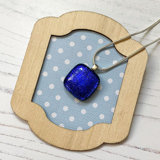 This ingenue handmade glass necklace is in multicoloured dichroic glass. It is a handmade necklace inspired by the princess in all of us!