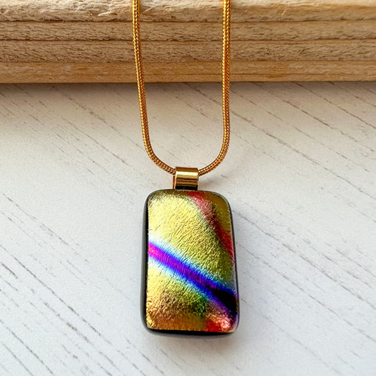 This twinkle stripe necklace is a handmade necklace that I make with my favourite type of glass, dichroic.