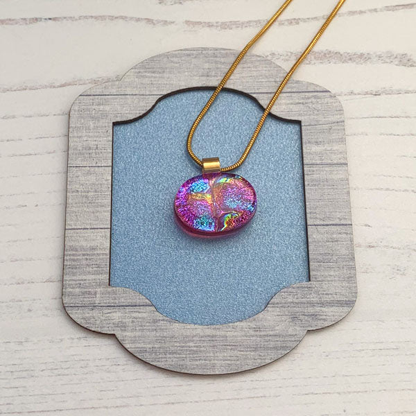 This ingenue multi pink necklace is in multicoloured dichroic glass. It is a handmade necklace inspired by the princess in all of us!