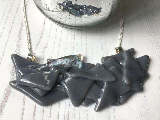 This grey statement glass necklace is a handmade necklace inspired by my favourite style of creating jewellery.