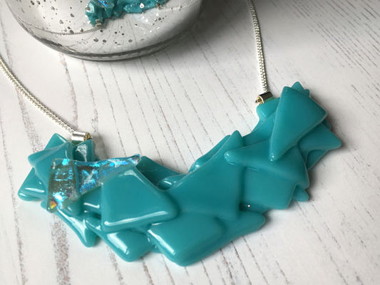 This turquoise statement glass necklace is a handmade necklace inspired by my favourite style of creating jewellery.