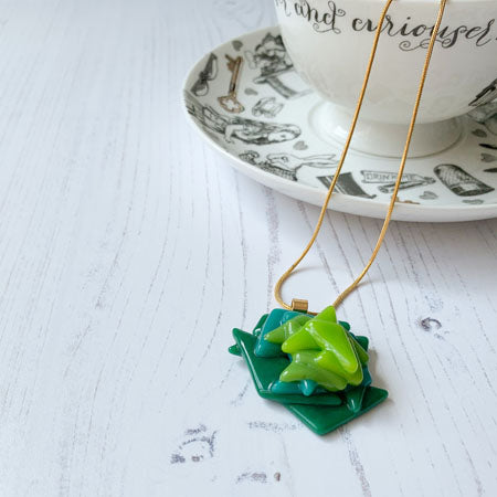 This green coloured signature glass necklace is a handmade necklace that is inspired by my favourite style of creating necklaces.