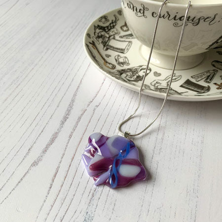 This purple signature glass necklace is a handmade necklace that is inspired by my favourite style of creating necklaces. 