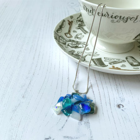 This white blue signature glass necklace is a handmade necklace that is inspired by my favourite style of creating necklaces.