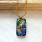 This twinkle purple glass necklace is a handmade necklace that I make with my favourite type of glass, dichroic.