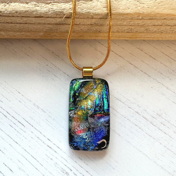 This twinkle purple glass necklace is a handmade necklace that I make with my favourite type of glass, dichroic.