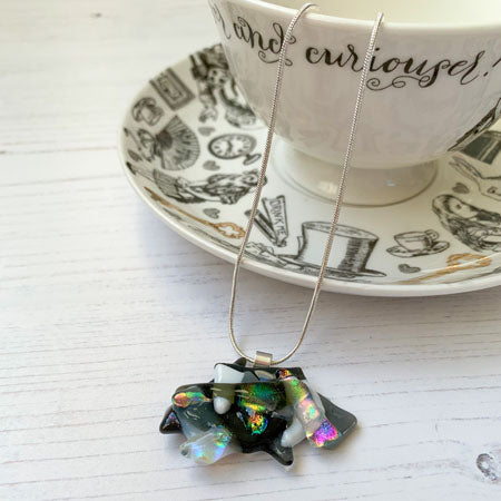 This monochrome rainbow glass necklace is a handmade necklace that is inspired by my favourite style of creating necklaces.