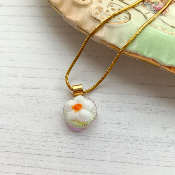 This white flower necklace is inspired by the nature from my local Pembrokeshire countryside. Handmade in Wales. Comes with a chain.