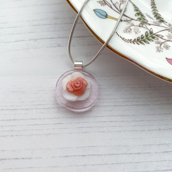 This pink flower necklace is inspired by the nature from my local Pembrokeshire countryside. Handmade in Wales. Comes with a chain.