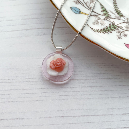 This pink flower necklace is inspired by the nature from my local Pembrokeshire countryside. Handmade in Wales. Comes with a chain.