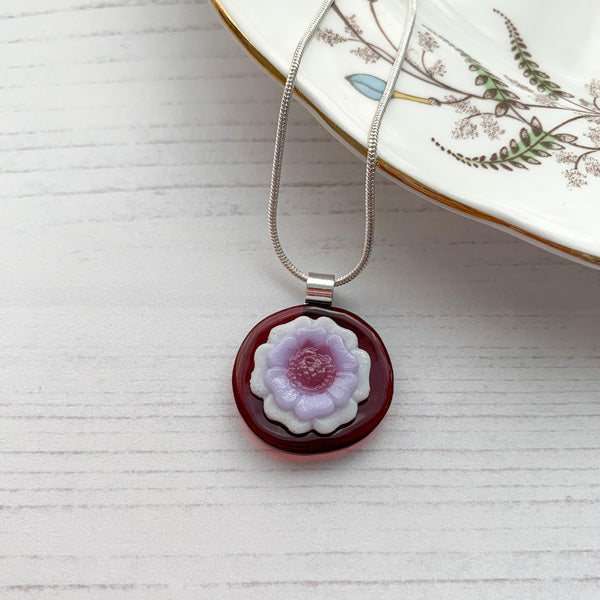 This purple white flower necklace is inspired by the nature from my local Pembrokeshire countryside. Handmade in Wales. Comes with a chain.