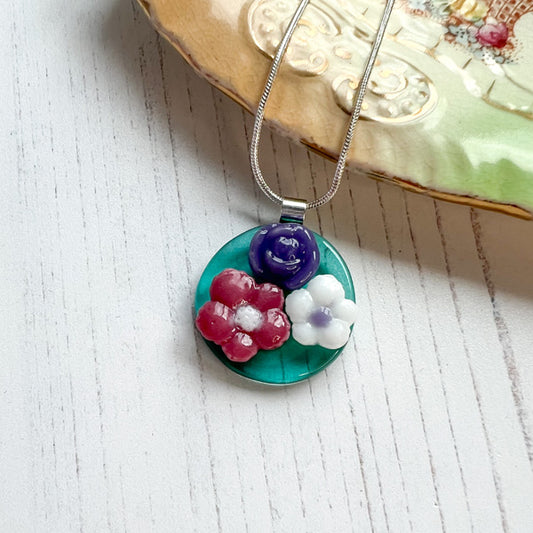 This trio of flowers necklace is inspired by the nature from my local Pembrokeshire countryside. Handmade in Wales. Comes with a chain.