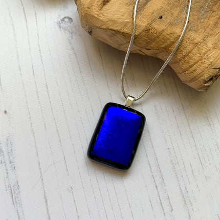 This twinkle blue necklace is a handmade necklace that I make with my favourite type of glass, dichroic.