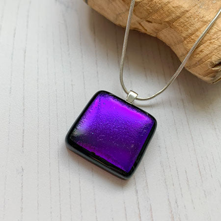 This twinkle purple green necklace is a handmade necklace that I make with my favourite type of glass, dichroic.
