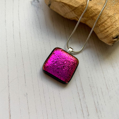 This twinkle pink necklace is a handmade necklace that I make with my favourite type of glass, dichroic.