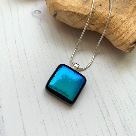 This twinkle aqua necklace is a handmade necklace that I make with my favourite type of glass, dichroic.