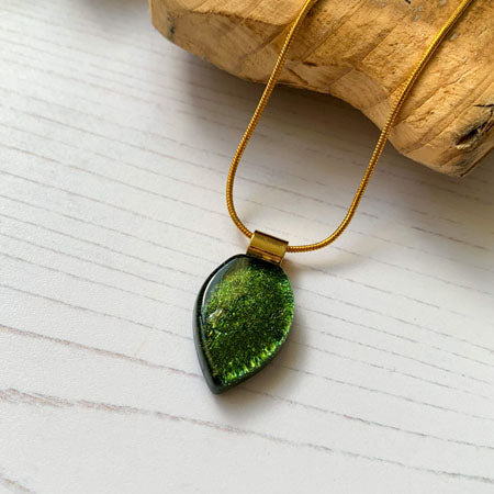This twinkle sparkly green necklace is a handmade necklace that I make with my favourite type of glass, dichroic.