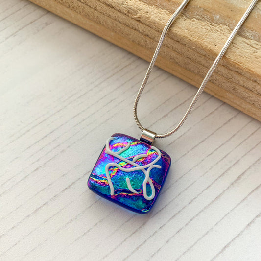 This twinkle scribbles necklace is a handmade necklace that I make with my favourite type of glass, dichroic.