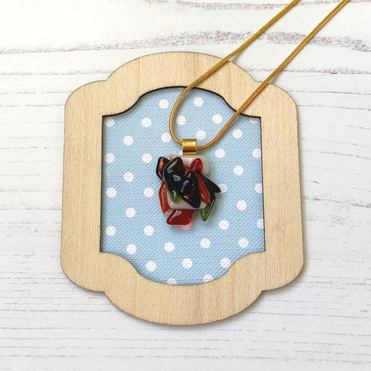This ingenue autumn handmade necklace is in multicoloured autumn glass. It is a handmade necklace inspired by the princess in all of us!