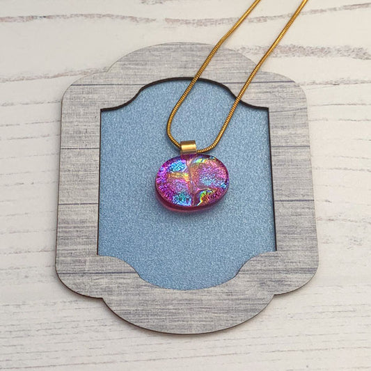 This ingenue multi pink necklace is in multicoloured dichroic glass. It is a handmade necklace inspired by the princess in all of us!