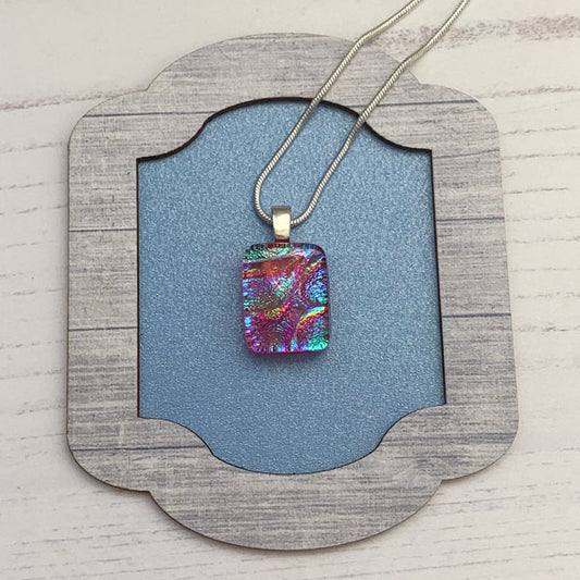 This ingenue mini rainbow necklace is in multicoloured dichroic glass. It is a handmade necklace inspired by the princess in all of us!