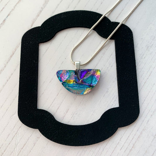 This ingenue colourful handmade necklace is in multicoloured dichroic glass. It is a handmade necklace inspired by the princess in all of us!