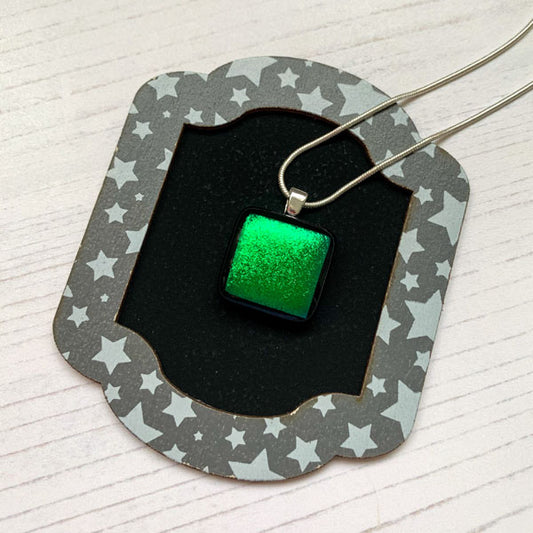 This ingenue bright green necklace is a handmade necklace that I make with my favourite type of glass, dichroic.
