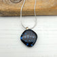 Black abstract star dichroic necklace