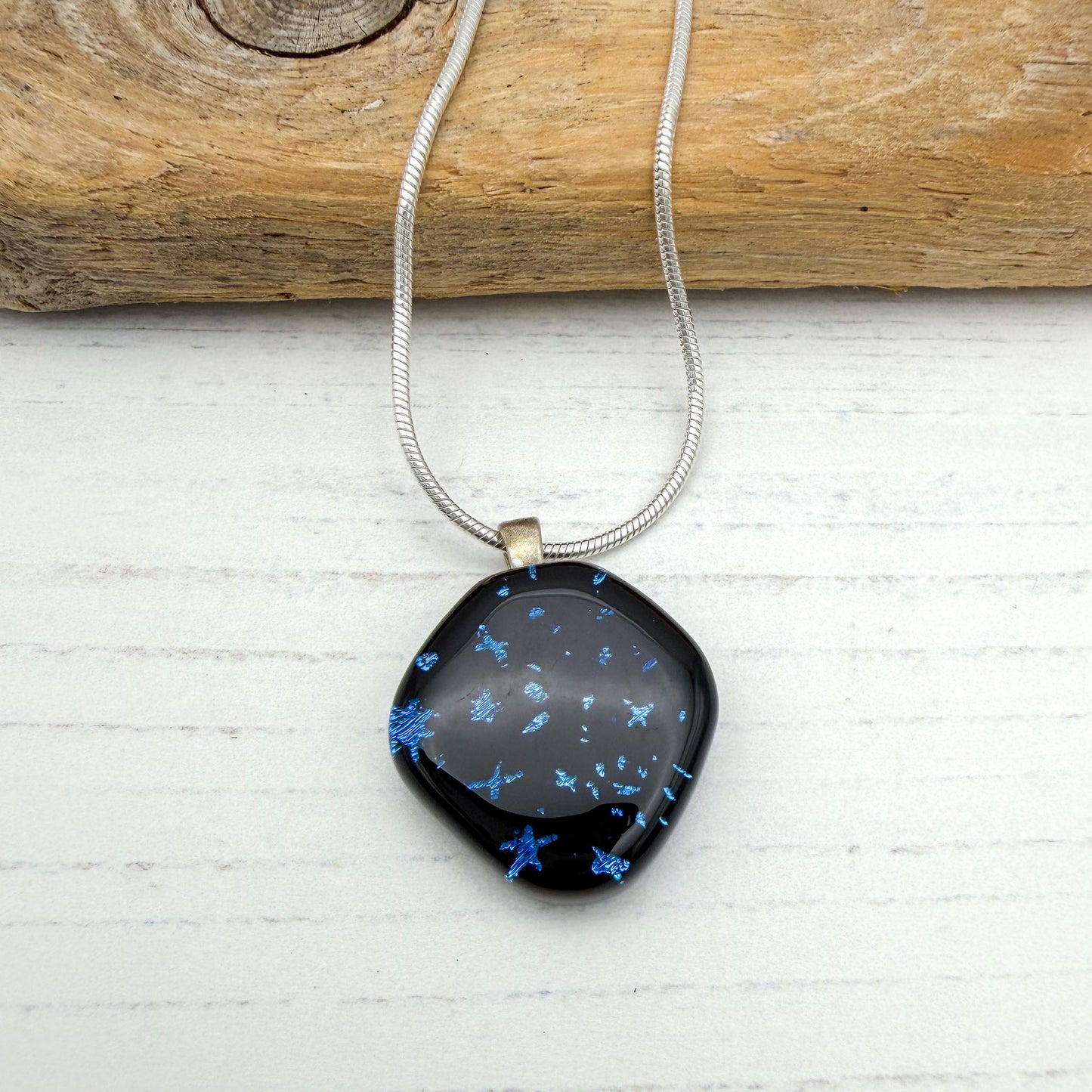 Black abstract star dichroic necklace