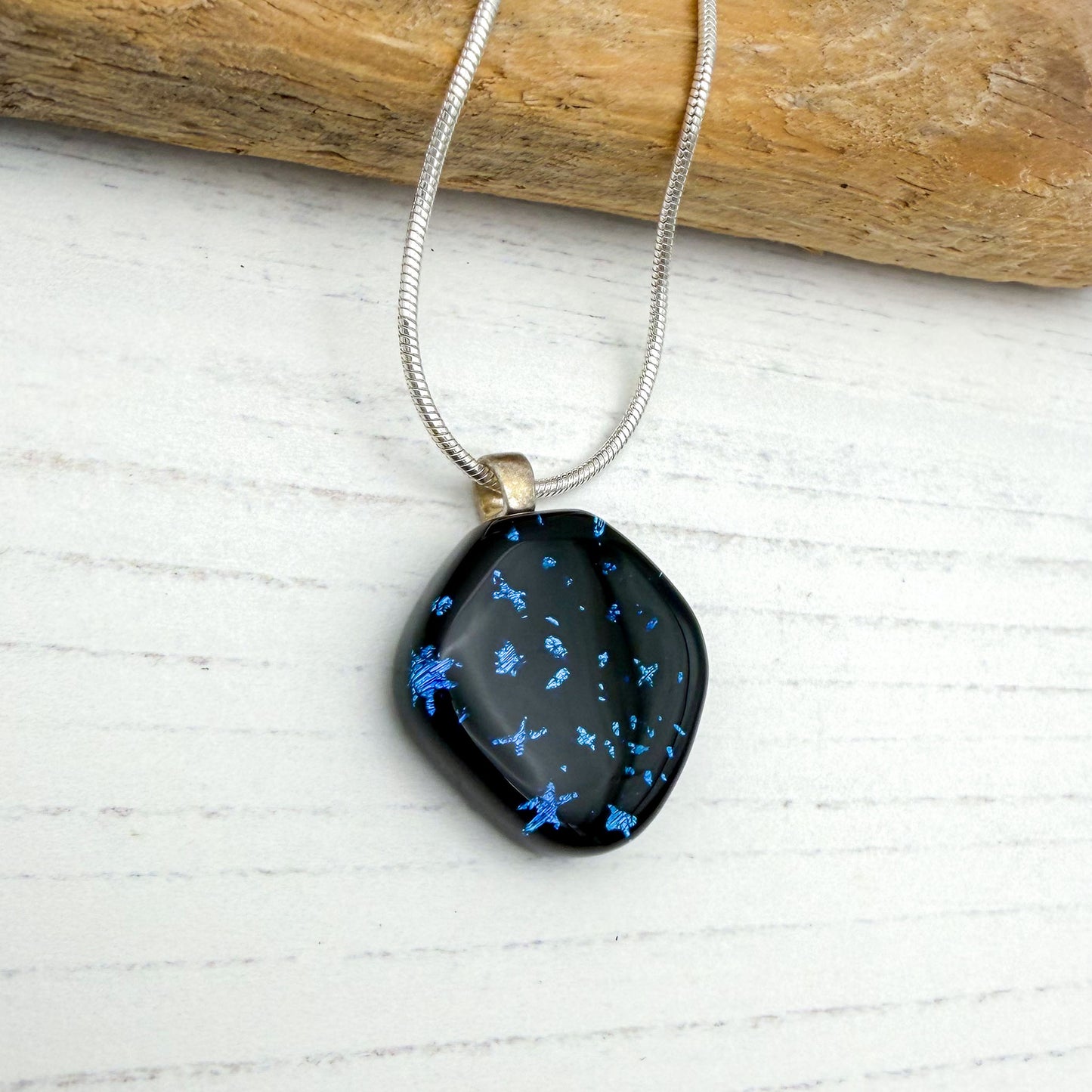 Black abstract star dichroic necklace